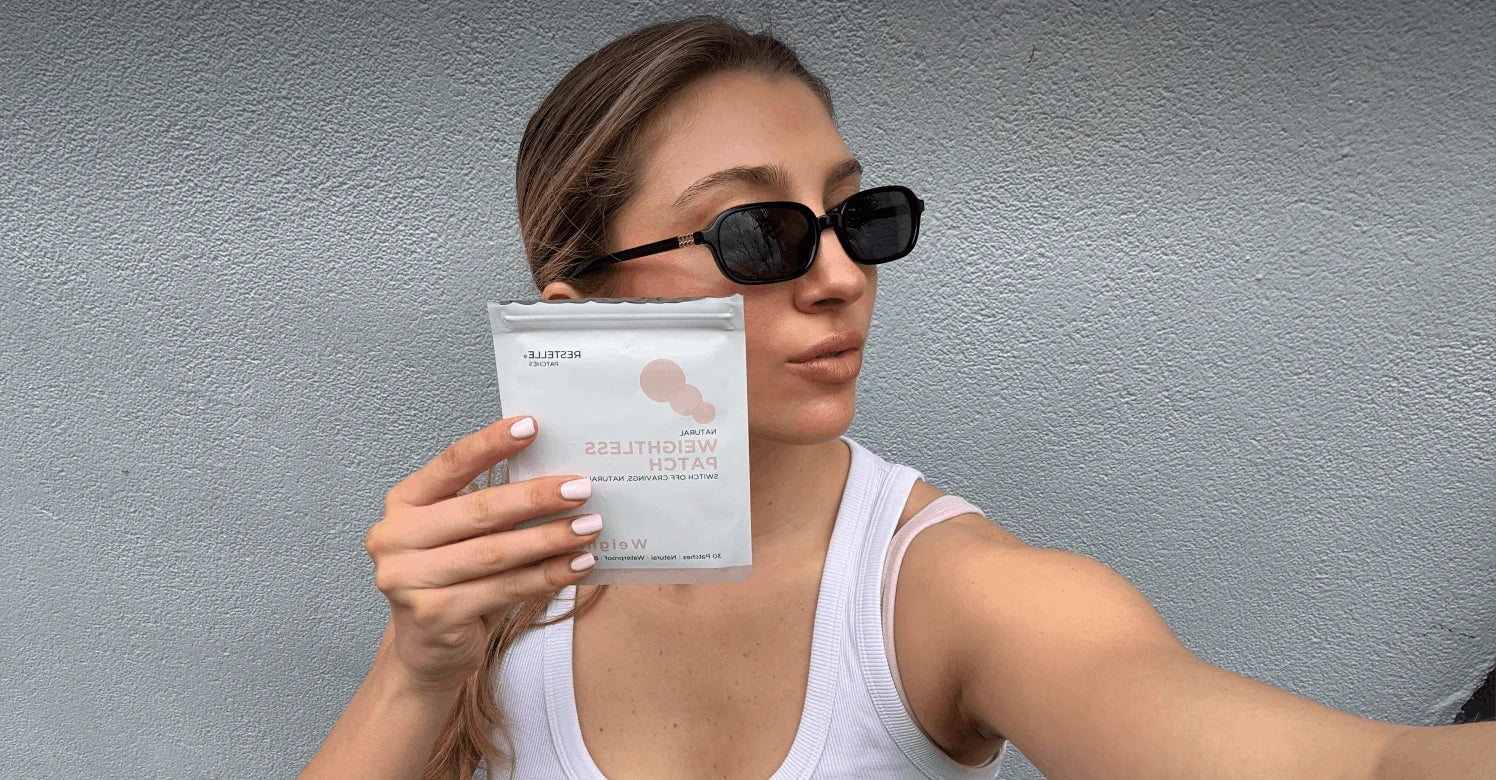 Restelle customer holding Weightless patches